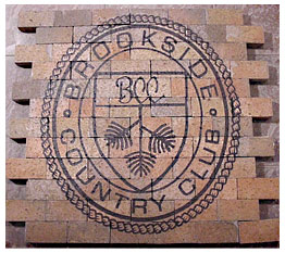 many engraved clay bricks with logo